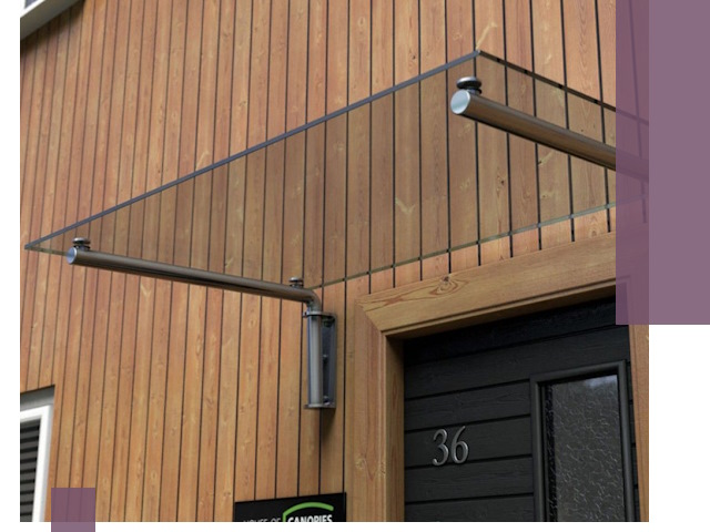 Стеклянные козырьки на входы и фасады в Ревде